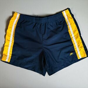 Woman’s Nike Dark Blue and Yellow Sports Shorts Size Small
